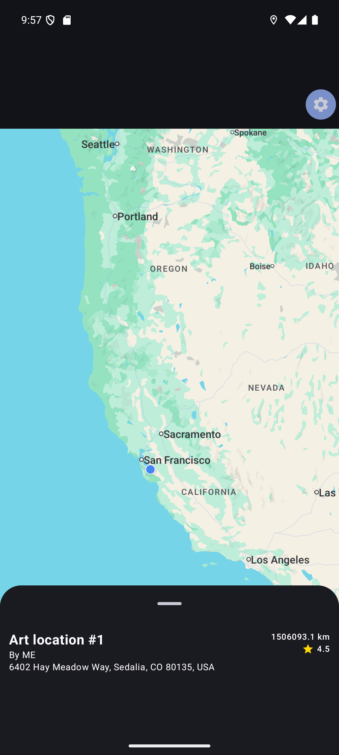 A map of the North American west coast, showing the current location near San Francisco. A bar on the bottom shows an art location in Sedalia, Colorado.
